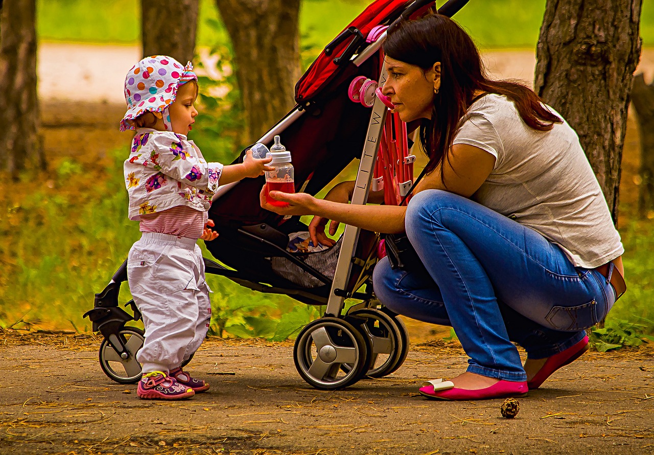 mom and baby with baby stroller